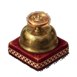 A brass bell-push on a red velvet cushion trimmed with a chequered band.