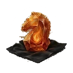 A large amber gem cut in the profile of a knight, resting on black rock.